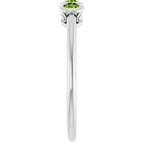 Round Peridot Three Stone Ring in Gold