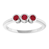 Round Ruby Three Stone Ring in Platinum