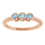Round Aquamarine Three Stone Ring in Rose Gold