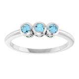 Round Aquamarine Three Stone Ring in Platinum