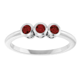 Round Mozambique Garnet Three Stone Ring in Platinum
