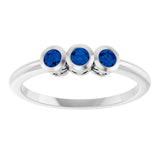 Round Blue Sapphire Three Stone Ring in Platinum