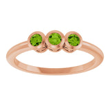 Round Peridot Three Stone Ring in Rose Gold