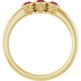 Round Ruby Three Stone Ring in Yellow Gold