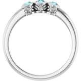 Round Blue Zircon Three Stone Ring in Platinum