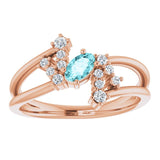 Oval Blue Zircon Accented Ring with Diamond Accents in Rose Gold