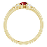 Oval Mozambique Garnet & Diamond Accented Ring in Yellow Gold