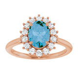 Oval Swiss Blue Topaz & Diamond Halo Ring in Gold and Platinum