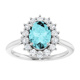 Oval Blue Zircon Halo Ring with Diamond Accents in Gold