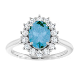 Oval Swiss Blue Topaz Halo Ring with Diamond Accents in Gold