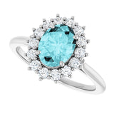 Oval Blue Zircon Halo Ring with Diamond Accents in Gold