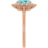 Oval Blue Zircon & Diamond Halo Ring in Gold and Platinum