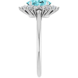 Oval Blue Zircon Halo Ring with Diamond Accents in Gold