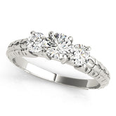 Iconic Three-Stone Round Diamond Engagement Ring — 9K/18K Gold & Platinum