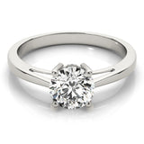 Round Cut Diamond Claw Setting Engagement Ring.
