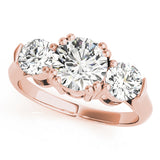 Rose gold ring with three round diamonds