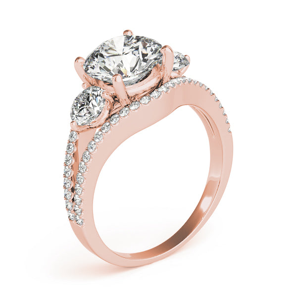 Rose gold ring with two large diamonds and smaller diamonds
