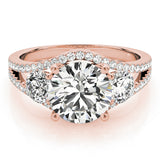 Rose gold ring with a large diamond and smaller diamonds