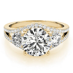 Gold ring with a large diamond and smaller diamonds
