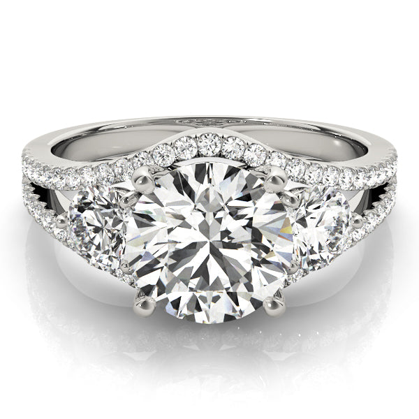 A diamond ring with a large central gemstone and smaller stones