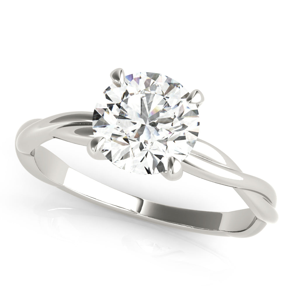 A lab-grown diamond round cut solitaire engagement ring with a twisted band, displayed on a white background.