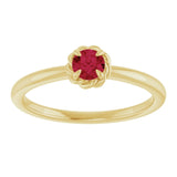 Round Ruby Solitaire Ring in Gold and Platinum