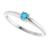 Round Blue Zircon Solitaire Ring in Gold and Platinum