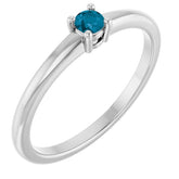 Round London Blue Topaz Solitaire Ring in Gold and Platinum