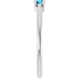 Round Blue Zircon Solitaire Ring in Gold and Platinum