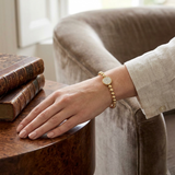 Bracelet de tennis de luxe en or et platine, serti de diamants ronds.