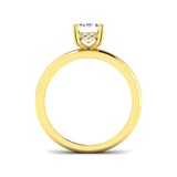 Classic emerald cut solitaire diamond ring in yellow gold with elegant simplicity