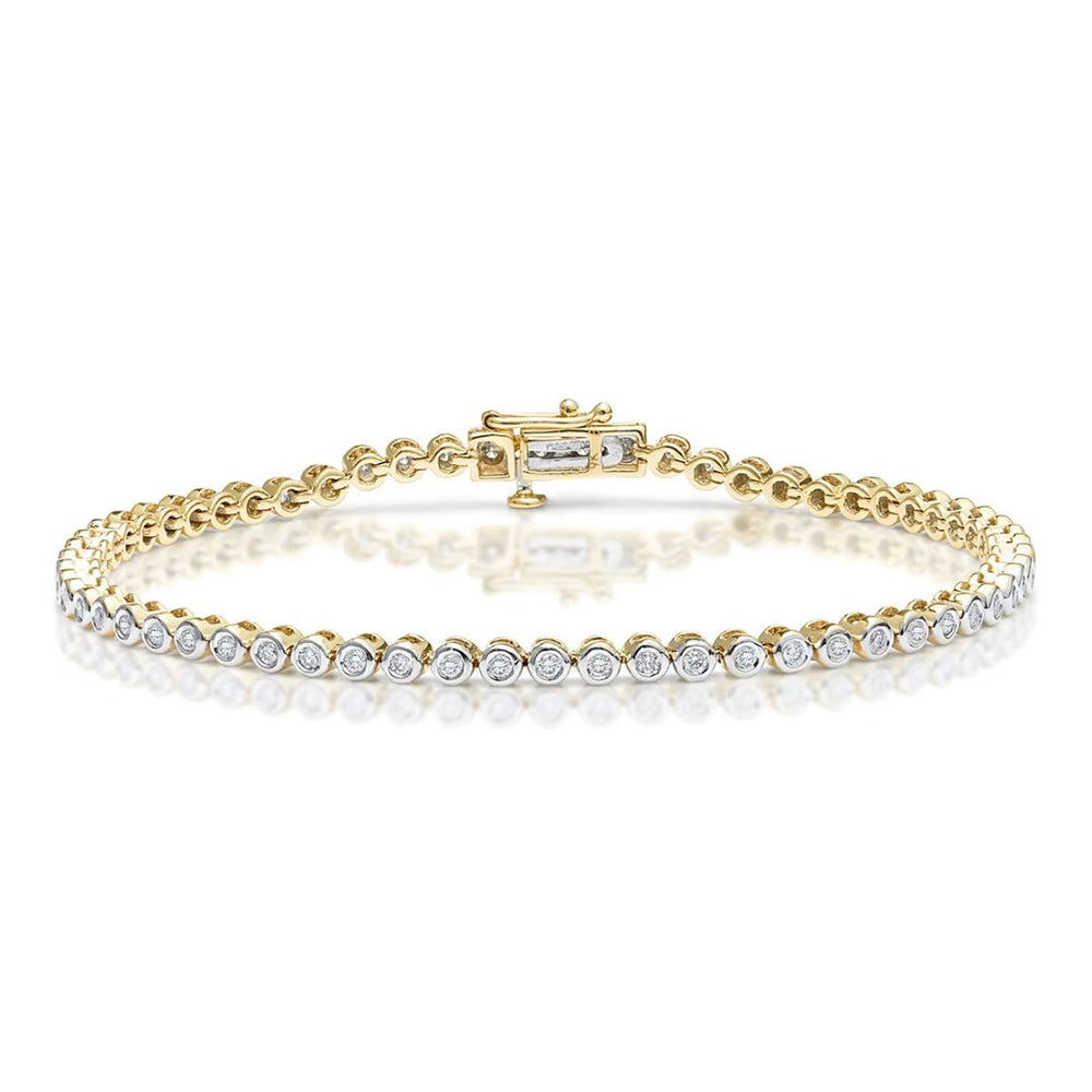 A yellow gold tennis bracelet with a diamond inset in a rub-over setting.