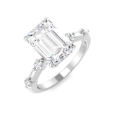Emerald cut diamond engagement ring with side diamonds in white gold