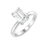 Emerald cut diamond solitaire engagement ring in white gold with a sleek polished band