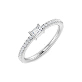 Emerald cut diamond solitaire engagement ring with pavé band in white gold, featuring a natural diamond