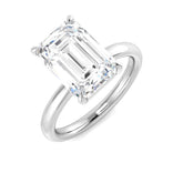 Emerald cut diamond solitaire engagement ring in white gold featuring a natural diamond F-G color VS-SI clarity or IGI certified lab grown diamond D color VVS clarity