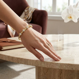 Bracelet de tennis de luxe en or et platine, serti de diamants ronds.