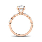 Rose gold ring with a heart-shaped diamond on a white background