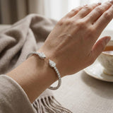 18K White Gold Natural Round Pave Open Cuff Diamond Bangle with Pear Solitaire Ends