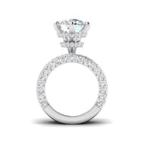 Luxury round diamond ring featuring wide pavé diamond band in white gold