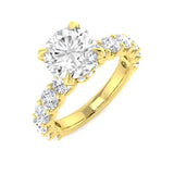 Gold ring with a large central diamond and smaller diamonds on the sides against a white background