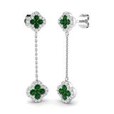 Emerald diamond drop link earrings with pavé halo diamonds in white gold