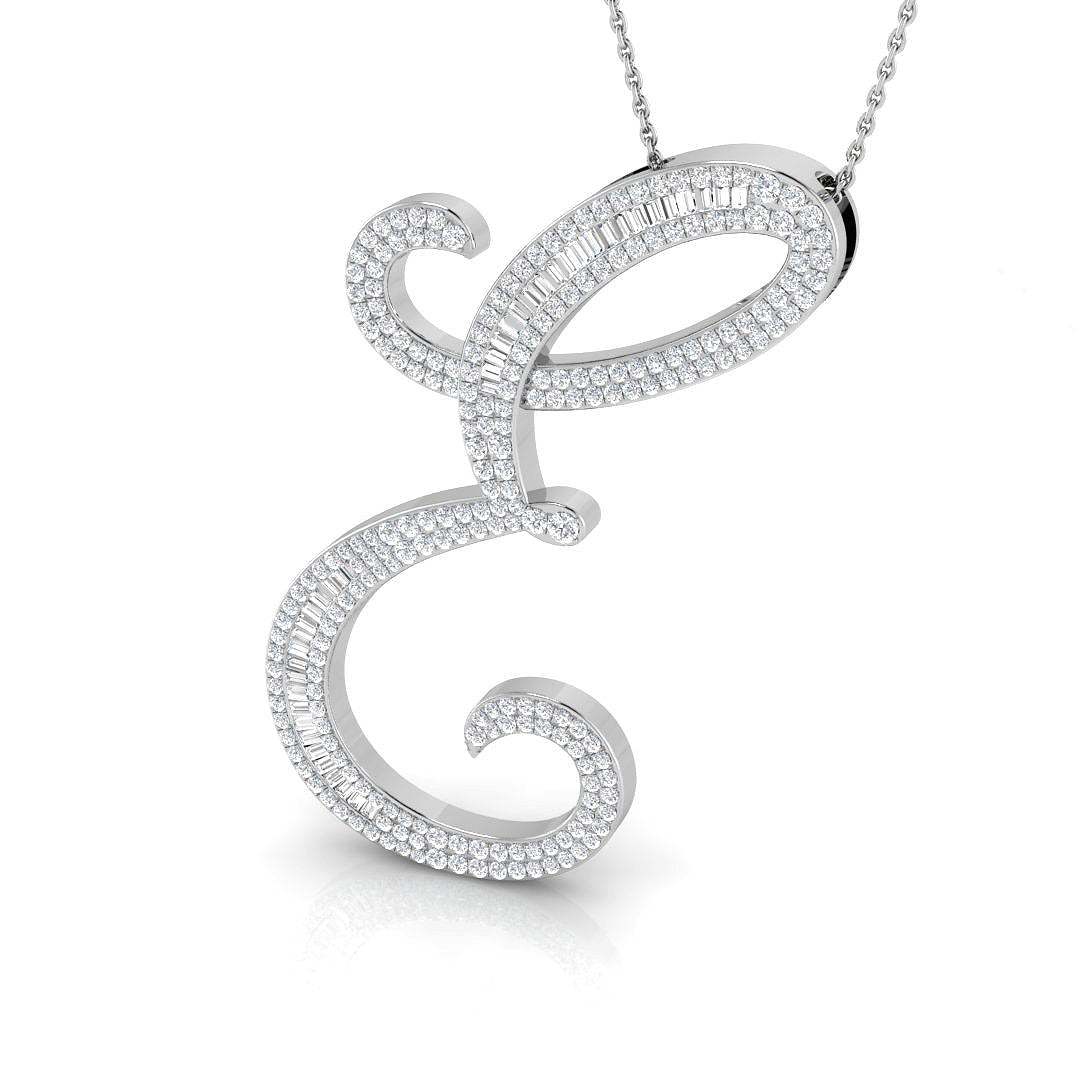 Gold initial pendant with baguette and round cut diamonds.