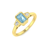 Aquamarine Ring with Emerald Cut Centre and Baguette Diamonds