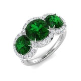 Emerald Three Stone Ring with Diamond Halo