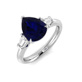 Pear Cut Blue Sapphire Three Stone Ring with Natural Baguette Side Stones | UK Hallmarked