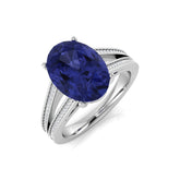 Oval Cut Tanzanite Ring with Pave Natural Diamonds in Platinum