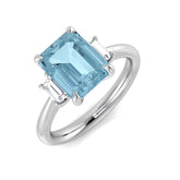 Emerald Cut Aquamarine Three Stone Ring in White Gold