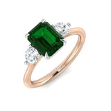 Emerald Ring with Round Side Stones