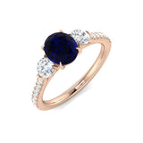 Blue Sapphire Three Stone Ring with Round Diamond Side Stones & Pave Band